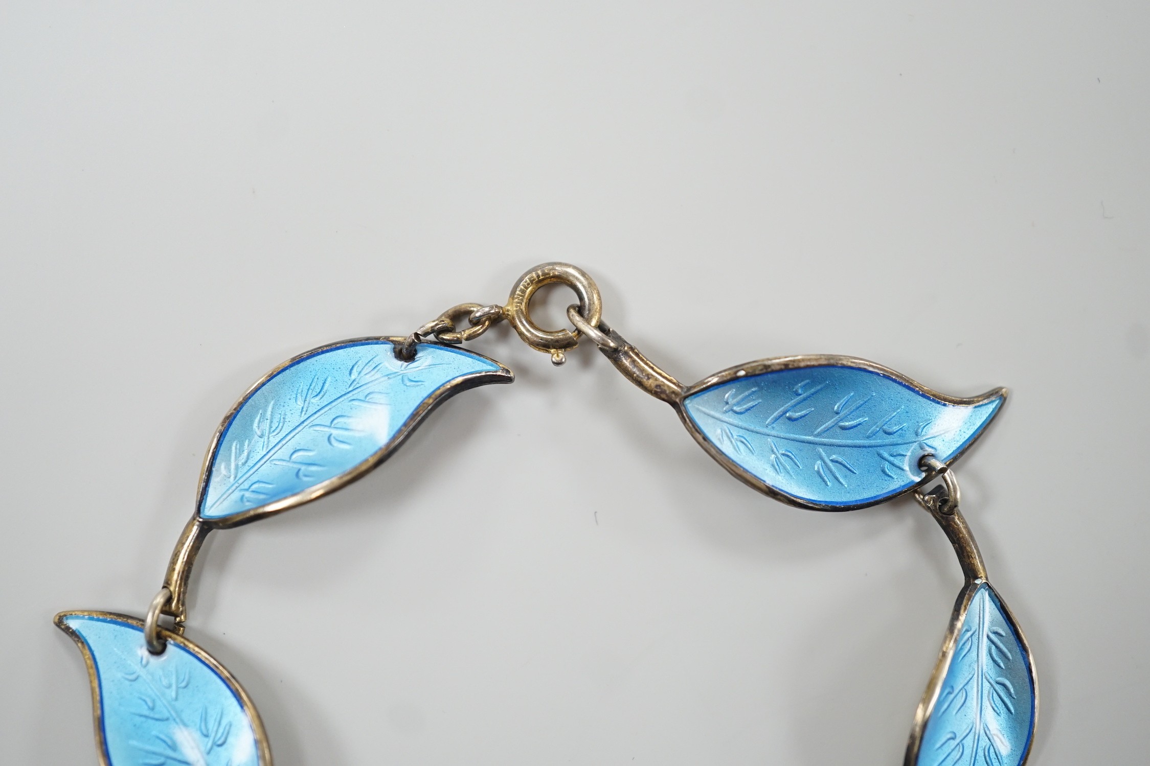 A 20th century Norwegian 925 sterling and blue enamel set leaf bracelet, by David Andersen, 16.5cm.